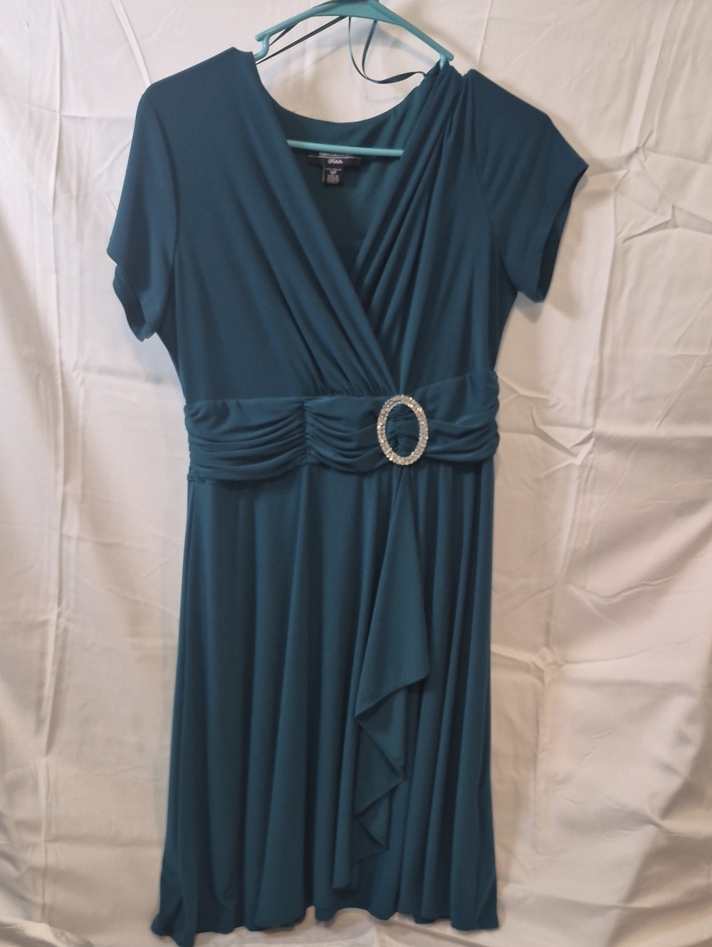 R&M Richards short-sleeve teal faux-wrap dress featuring a sparkling rhinestone